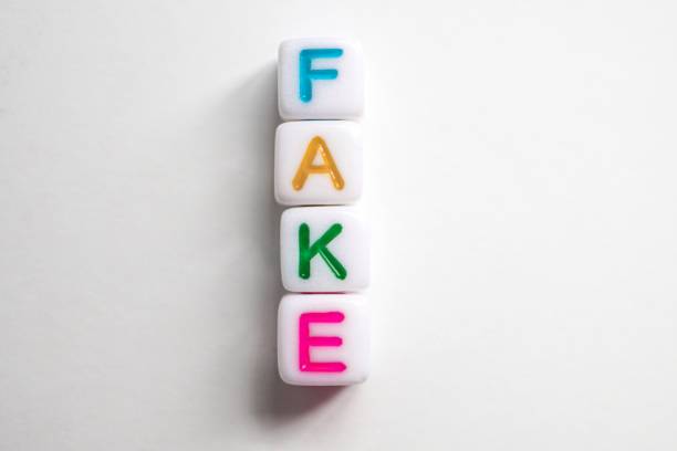 istock word fake with colorful letters on white background 2193254537