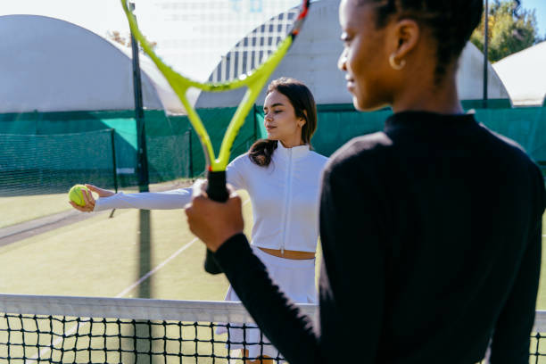 istock African fit woman tennis player with racket 2193257698