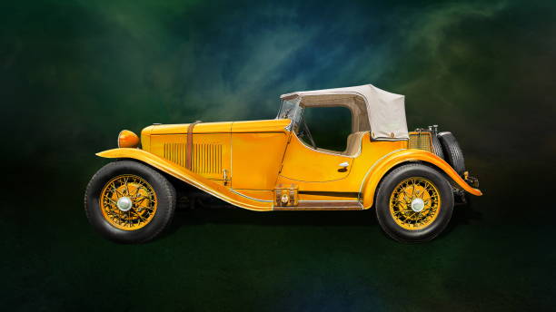 yellow vintage car on dark cloudy background