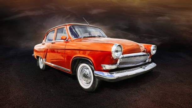 istock orange vintage car on dark background 2193259211