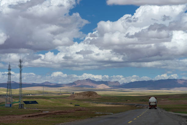 Plateau mountains grassland and road