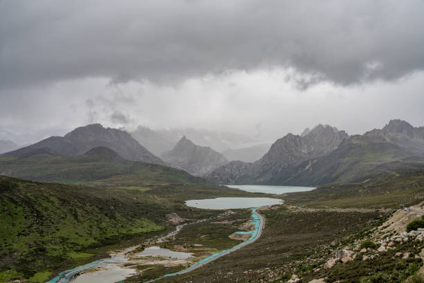 Cloudy plateau grasslands, mountains and rivers