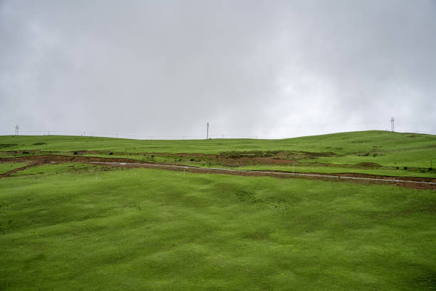 Plateau mountains and grass on a cloudy day