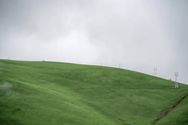Plateau mountains and grass on a cloudy day