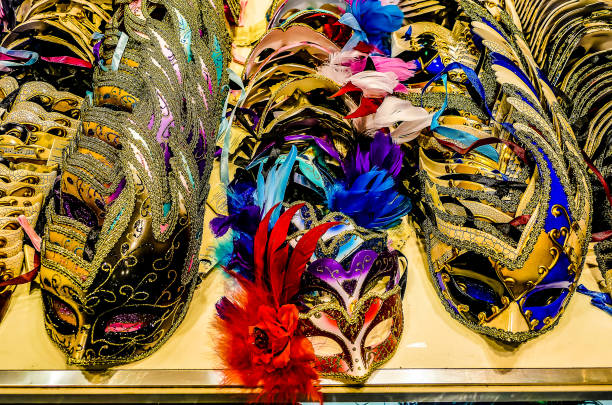 Venice, Italy - February 8, 2024: The Carnival of Venice (Italian: Carnevale di Venezia) is an annual festival held in Venice, Italy, famous throughout the world for its elaborate costumes and masks. \nThe Carnival ends on Shrove Tuesday (Martedì Grasso or Mardi Gras), which is the day before the start of Lent on Ash Wednesday (February-March).\nThe Carnival traces its origins to the Middle Ages, existing for several centuries until it was abolished in 1797. The tradition was revived in 1979, and the modern event now attracts approximately 3 million visitors annually.