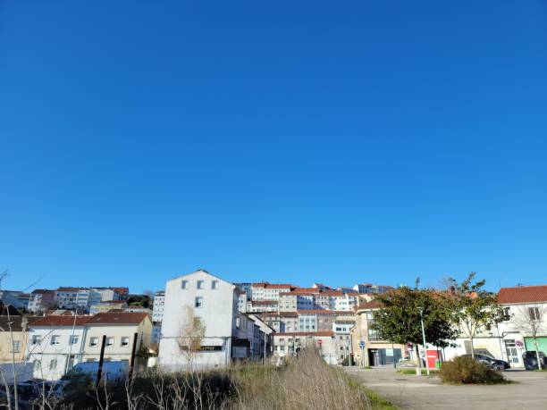 istock Residential Neighborhood Under a Clear Blue Sky 2193268949