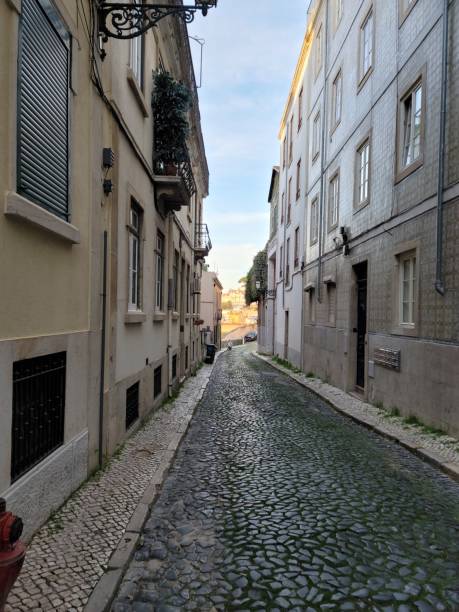 istock Quiet Cobblestone Street in Lisbon 2193270665