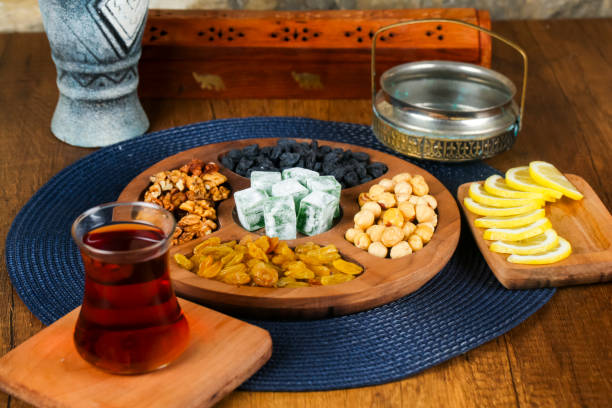 istock Traditional Persian tea setup with assorted snacks and fruits 2193277592