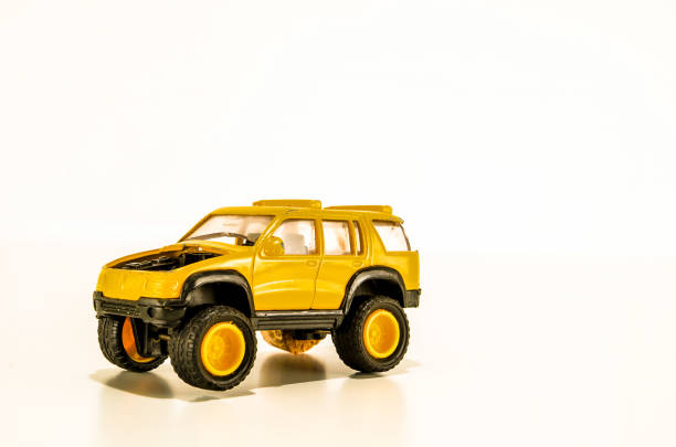 istock A yellow toy truck with a black engine 2193279059