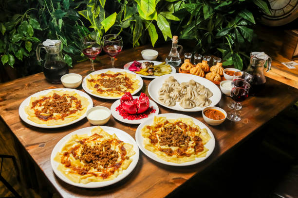 istock Tasty dishes served at a dinner gathering in a cozy setting 2193280296
