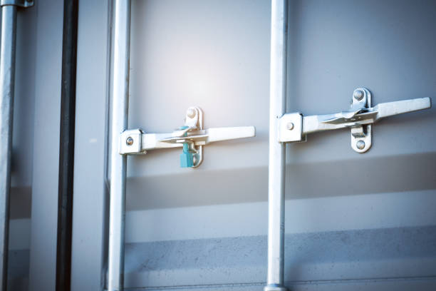 istock Container door locked with protective lead seal. box container shipping. truck transport, freight truck logistics. 2193282779