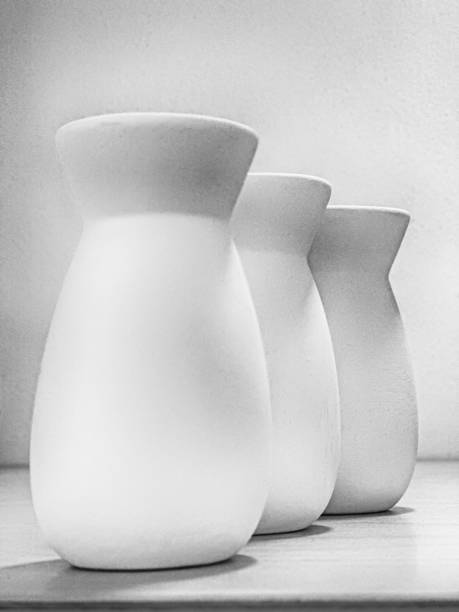 istock Still Life With Three White Ceramic Vases In Black And White 2193282938
