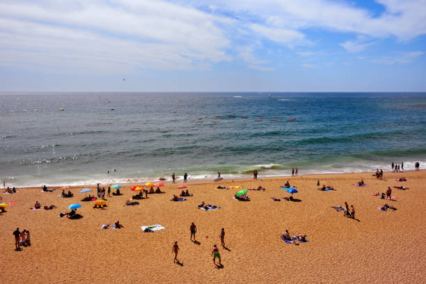 tourists and bathers on the beach Algarve coastal town, very popular holiday destination, with sandy beaches and a lively nightlife 15 September 2024 Albufeira Portugal