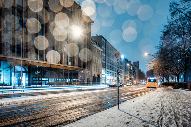 motion burred car on slippery frozen street in snowy central berlin