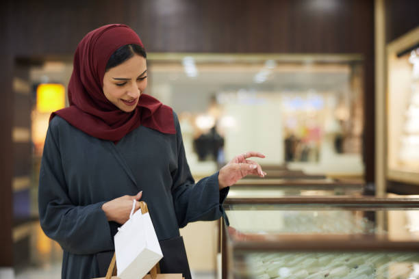 istock A customer looks at the merchandise exposed in a boutique display. 2193292057