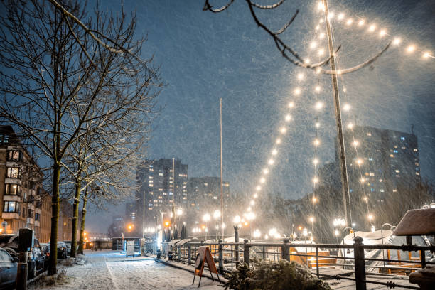 shining light decoration at Fischerinsel in Berlin in snowy winter night