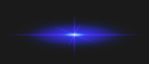 istock A design featuring an intense blue burst of light against a dark background. A glowing lens flare effect, ideal for futuristic, digital, or modern compositions 2193294022