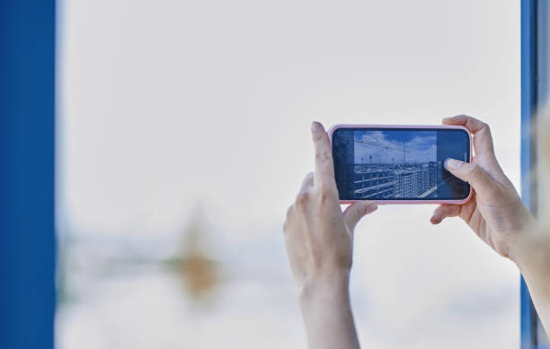 istock Engineer at the office making mobile shot of the construction site 2193294066