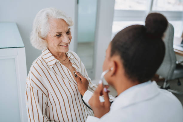 istock Doctor checking patient's heartbeat 2193298137