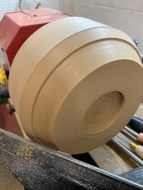 istock Process of turning a wood blank into a salad bowl 2193300691