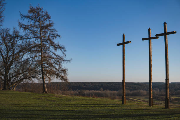 istock landscape with three crosses standing on the side of a cliff 2193301866