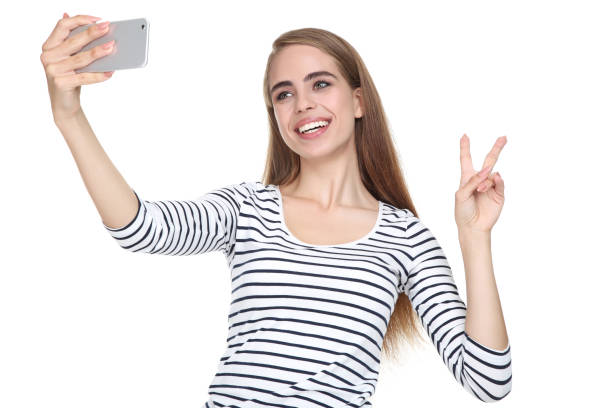 istock Young beautiful girl making selfie on smartphone 2193305938