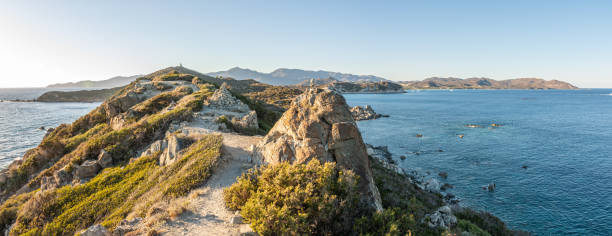 The path that runs along Capo Carbonara in Villasimius, with the sea on both sides