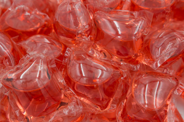 istock Gel capsules with laundry detergent close up, Full frame background 2193320893