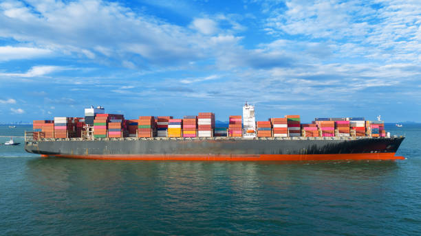 istock Aerial side view of cargo ship carrying container and running for export cargo yard port to custom ocean concept technology transportation , customs clearance, webinar banner forwarder mast 2193322759