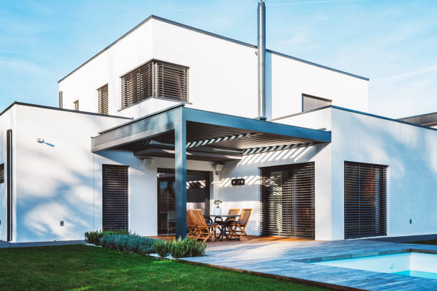 istock Modern White House roof with Patio and Pool 2193323812