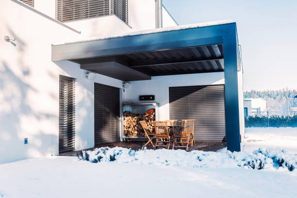istock Modern House terrace Snowy Patio with Dining Set 2193323815