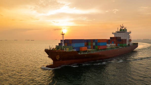 istock Aerial side view of cargo ship carrying container and running for export cargo yard port to custom ocean concept technology transportation , customs clearance, webinar banner forwarder mast 2193324150