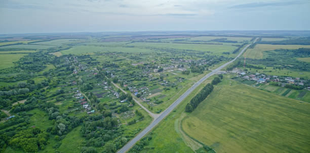istock Rural area with a road running through it 2193327697