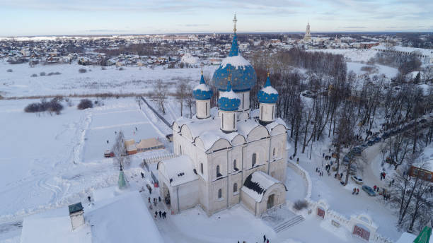 istock Blue and white church with a snow covered roof 2193327798