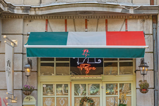 Belgrade, Serbia - December 22, 2024: Front View of Italian Restaurant Trattoria Pepe at Gospodar Jovanova Street Dorcol.