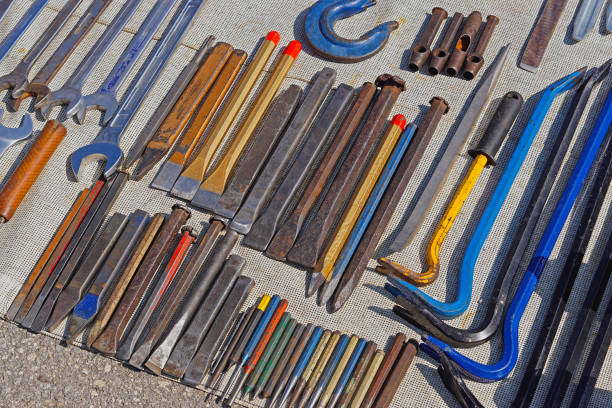 Various sizes of  chisels set metal tools and crowbars