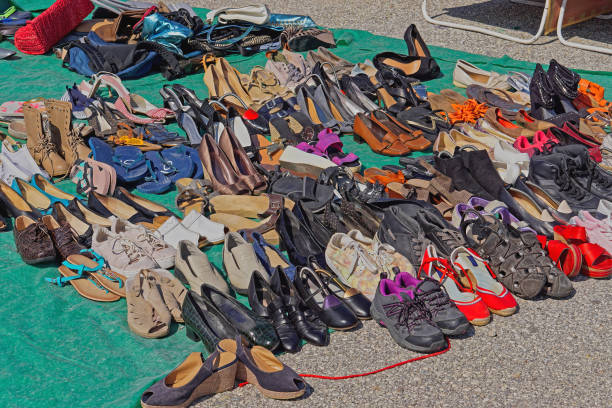 Used second hand leather women shoes and sandals for sale at flea market