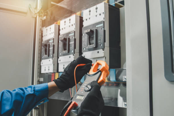 istock Electrical equipment maintenance service engineer Engineers carry AC voltmeters to check voltage at breaker terminals and inspect switchgear. 2193338875
