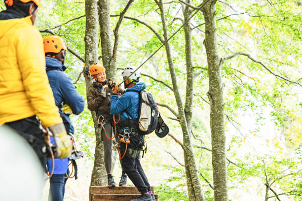 istock Diverse Group Receiving Zipline Instructions in Forest 2193341913