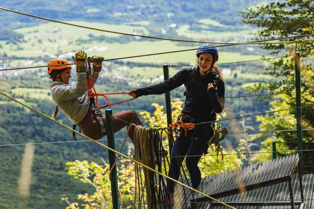 istock Caucasian Friends Enjoying a Zipline Adventure 2193341925