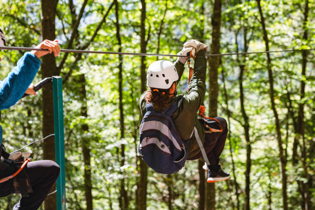 istock Adult On Zip Line Adventure Through Forest 2193342042