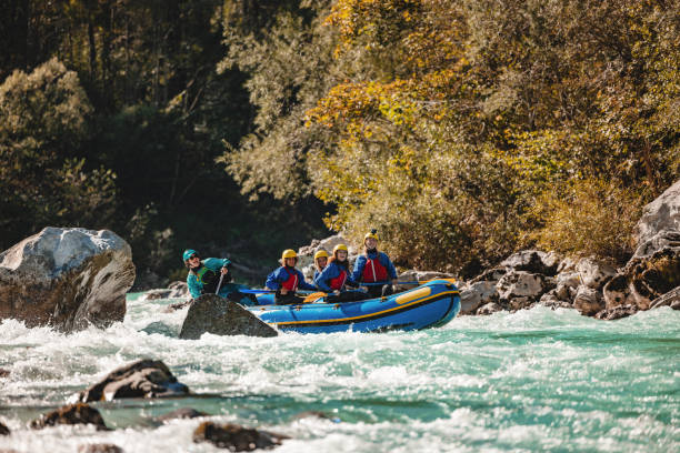 istock Family Enjoying Whitewater Rafting Adventure 2193342088
