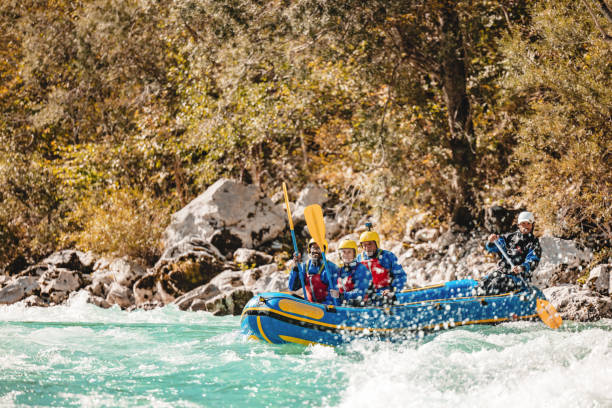 istock Family and Guide Enjoying White Water Rafting Adventure 2193342093