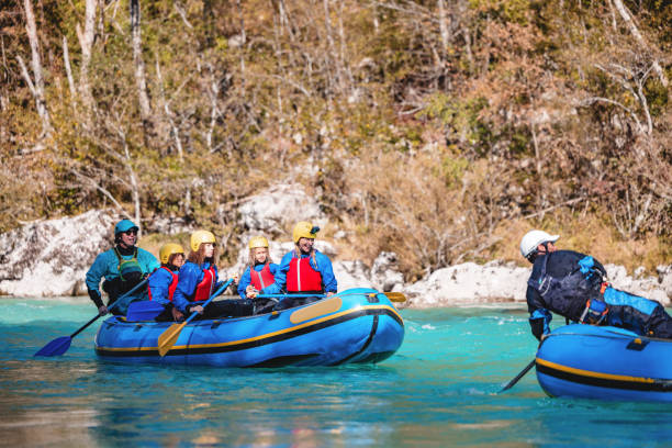 istock Family and Guide White Water Rafting on River 2193342101