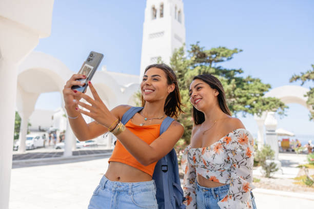 istock Young Women Taking Selfie at Santorini 2193342229