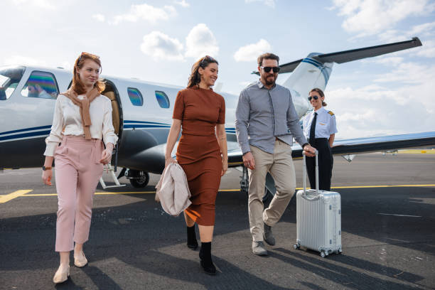 istock Affluent Family with Private Jet and Pilot at Airport 2193342275