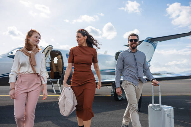 istock Affluent Family Walking Away from Private Jet After Vacation 2193342280