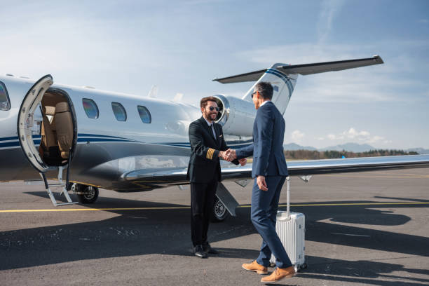 istock Businessman Greeting Pilot Near Private Jet Before Departure 2193342302