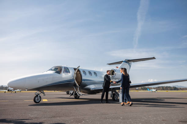 istock Asian Business Executives Boarding a Private Jet 2193342303