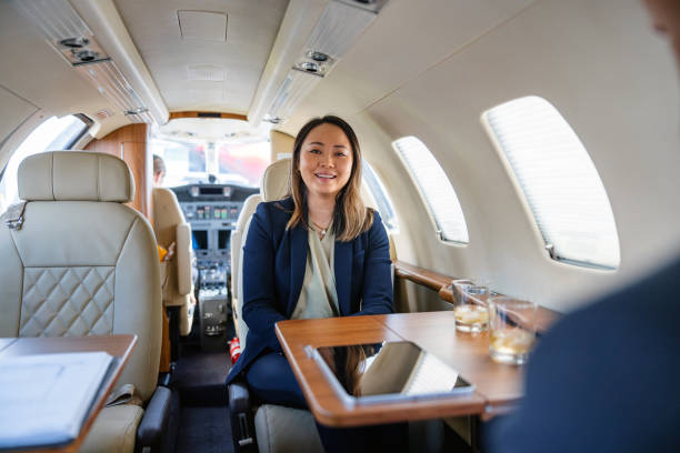 istock Asian Businesswoman on Private Jet 2193342312